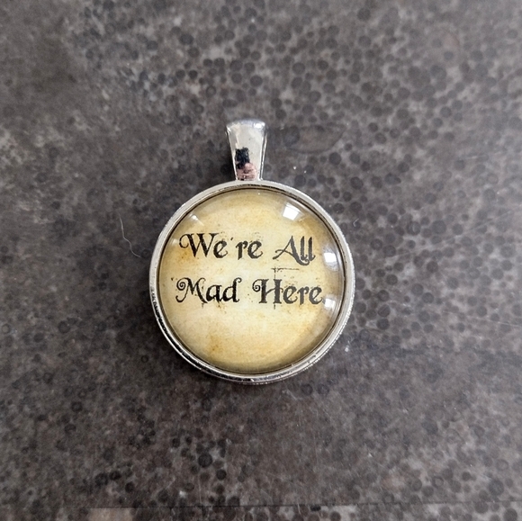 We're All Mad Here Alice In Wonderland Round Silver Pendant - Picture 1 of 3